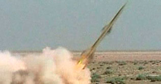 Iran claims firing missiles beyond its borders