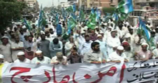 JI holds peace rally against unrest in Karachi
