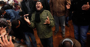 Libyan rebels bury their dead