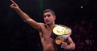 Amir beat Judha to win light welterweight unification title