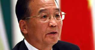 China PM vows to punish persons responsible train crash