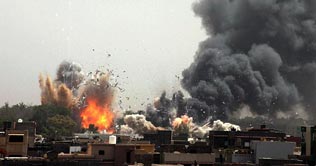 NATO planes target Gaddafis compound