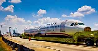 Hudson River plane on its way to Museum 