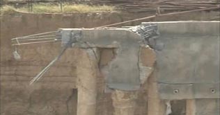 100 trapped as building caves in near Lahore airport