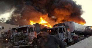 Helper killed, driver injured in NATO tanker attack