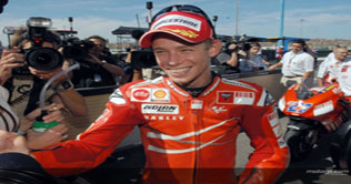 Casey Stoner secures first position in race