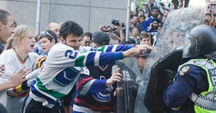 Fans turn violent after defeat in ice-hockey match