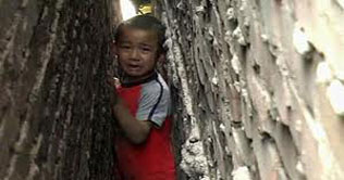 Chinese fire fighters rescue boy trapped between walls