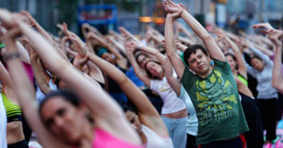 Hundreds perform yoga exercises at Time Square