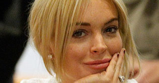 Troubled Lohan fails alcohol test