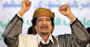Libya: Gaddafi strikes town, rebels call for foreign help