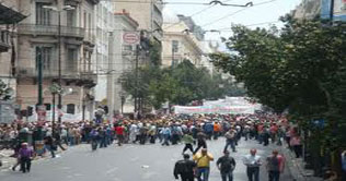 Greek citizens protest outside former PMs home