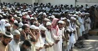 Maulana Madni, son laid to rest