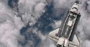 Discovery prepares to undock, bids farewell to space station