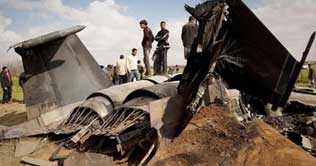 Coalition forces pound Libyan military targets, US jet crashed