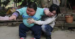 Chinese toddler wants to be superman