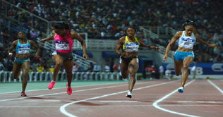 US romp in women's 4x100-meter in Philadelphia