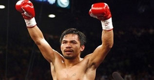 Welterweight champion Pacquiao reaches Las Vegas to defend title 
