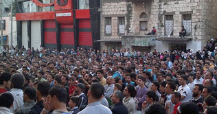 Syria: 10 security officials, 30 protesters killed in clash 