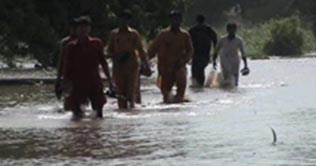 Hundreds of acres of land comes under water