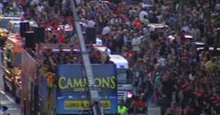 Barcelona fans exalted at third consecutive title win 