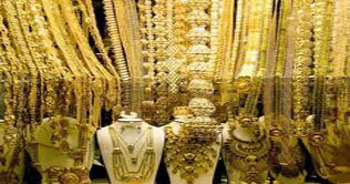 Price of 10 gram gold reaches Rs 42,428
