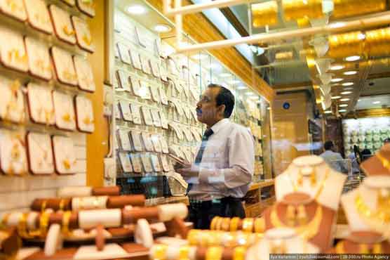 Despite rising waters, gold market booms in Bangkok