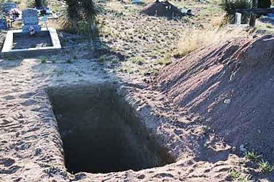 Man arrested for digging up women