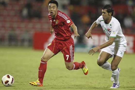 Iraq beat China with injury-time winner