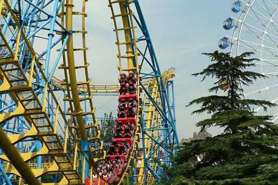 China: Rescuers free two girls stuck upside down in ride