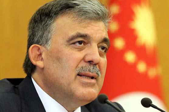 Turkish PM warns Assad his days are numbered