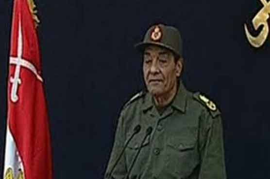 Egypt military ruler moves up presidential vote