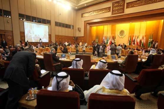In unprecedented step, Arab League sanctions Syria