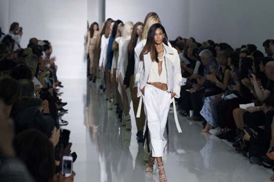 Kanye West makes fashion debut in Paris 