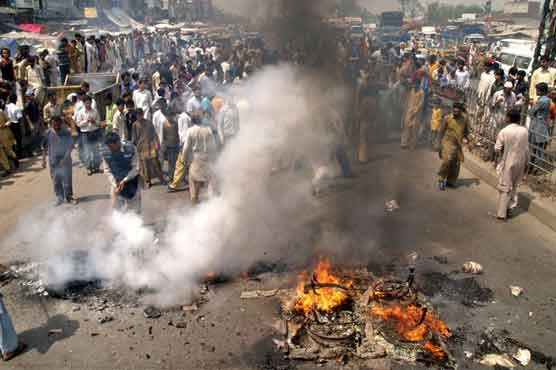 Street battles with police follow long power outages