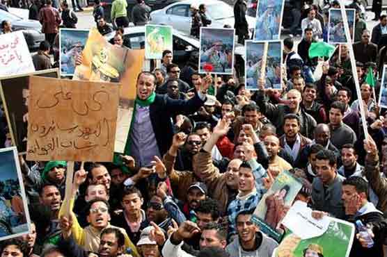 Gunbattles rage in Sirte as hospitals overflow with wounded