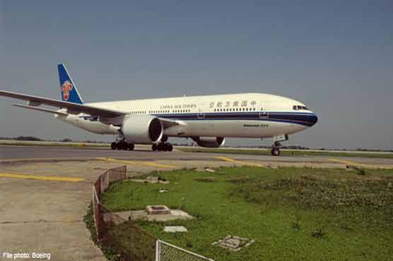 Bomb threat forces plane to land in China