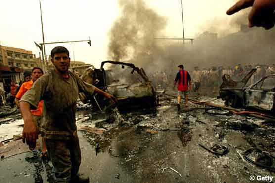 Twin explosions in Baghdad kill 15 people