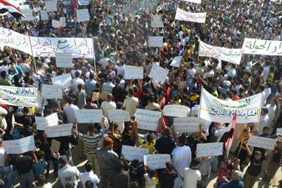 Syria troops kill 21 in flashpoint Homs: right group