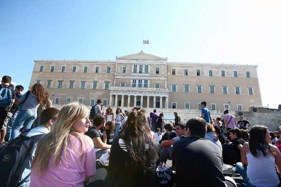 IMF chief to recommend aid for Greece