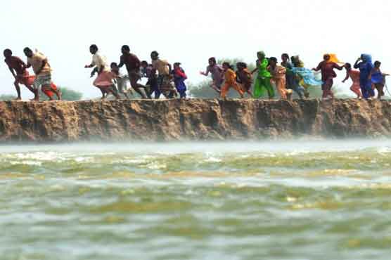 Badin: Rainwater submerges graveyard
