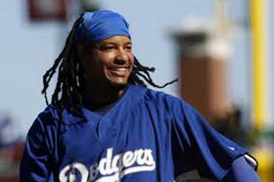 Ramirez charged with hitting wife