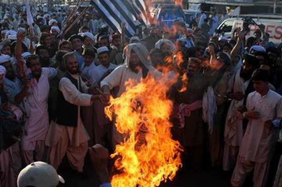 JI workers run riot in Bangladesh