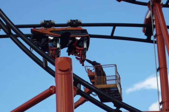 China: 2 people trapped in roller coaster 
