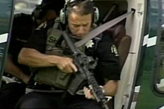 Washington: gunman shot dead near school field