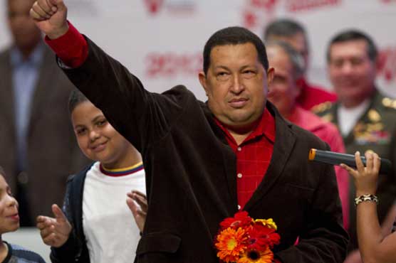 Anti-US Chavez back in Venezuela after treatment 