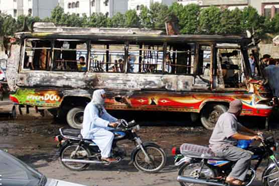 3 killed, bus torched as Karachi continues to burn