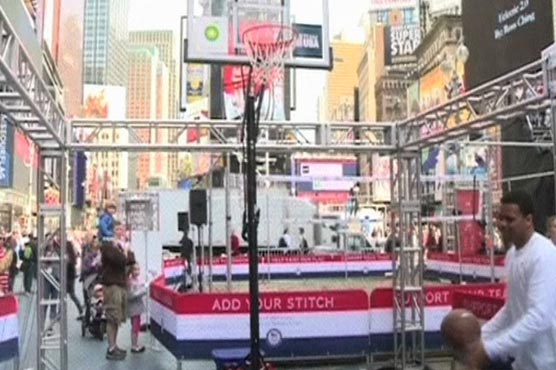 Simulated Olympic village built at Times Square