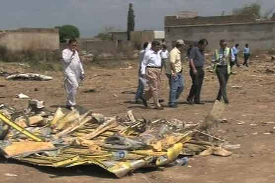 Stench spreads at the site of crash 