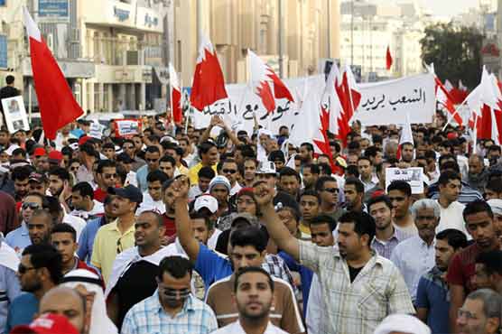 Bahrain mourners attack police after funeral march